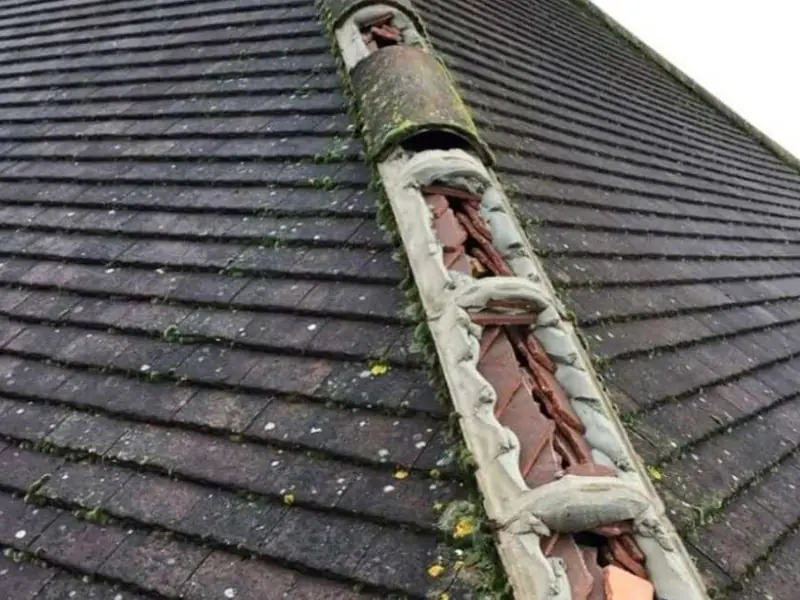 Storm damaged roof waiting for an emergency repair