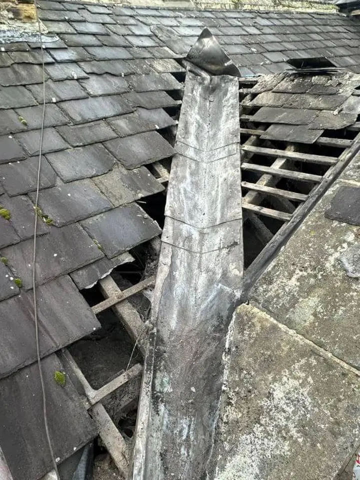 Damaged roof opened up for repair