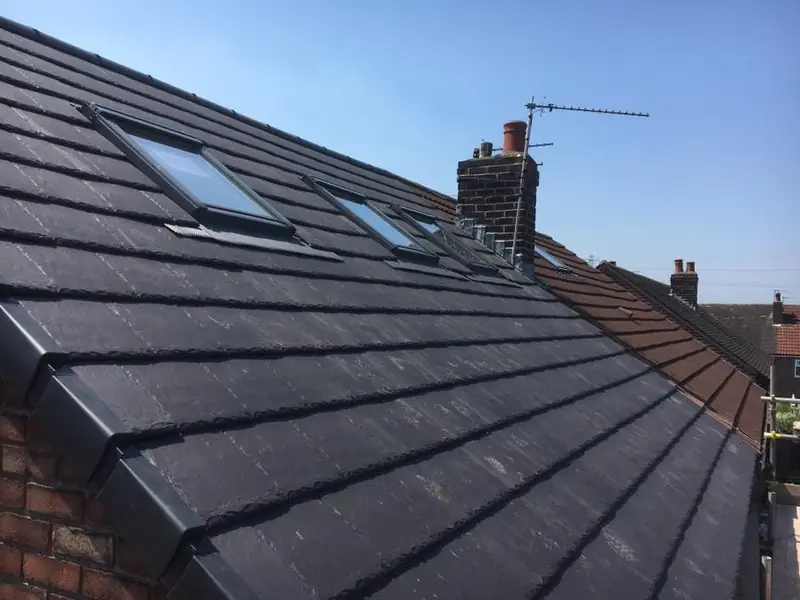 Courses of slate on a newly laid roof