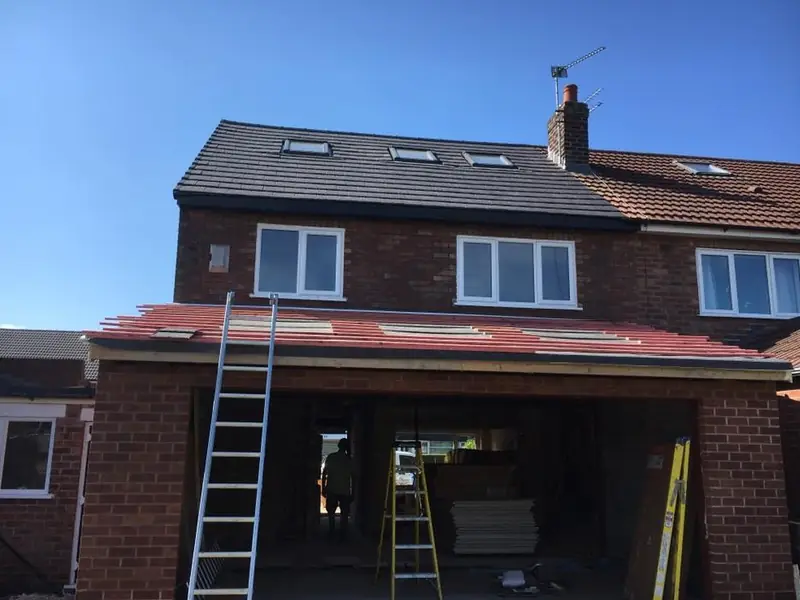 Re-tiled roof on a semi-detached house